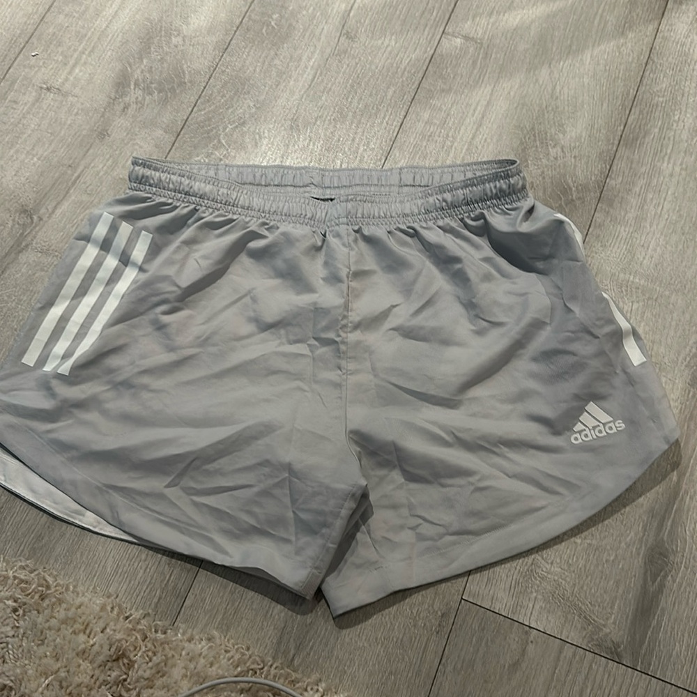 Light gray women’s Adidas Shorts Size Medium. Super lightweight and polyester.
